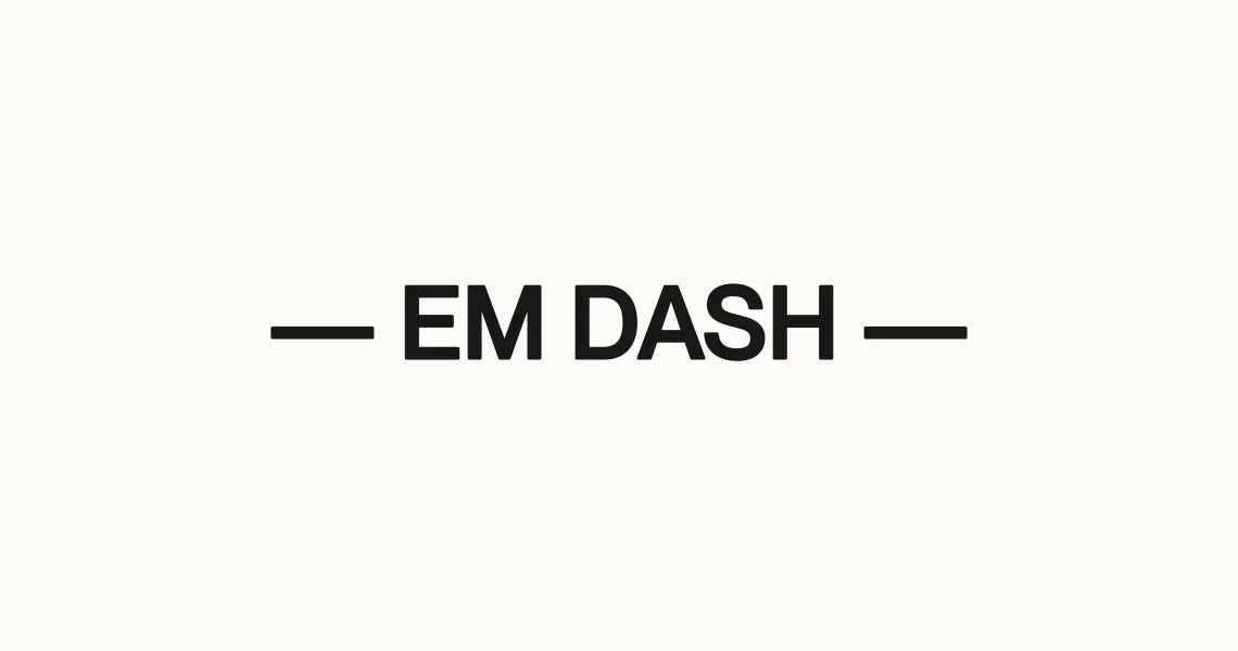 Heavy black text on a cream background reading, in em dashes, "EM DASH."